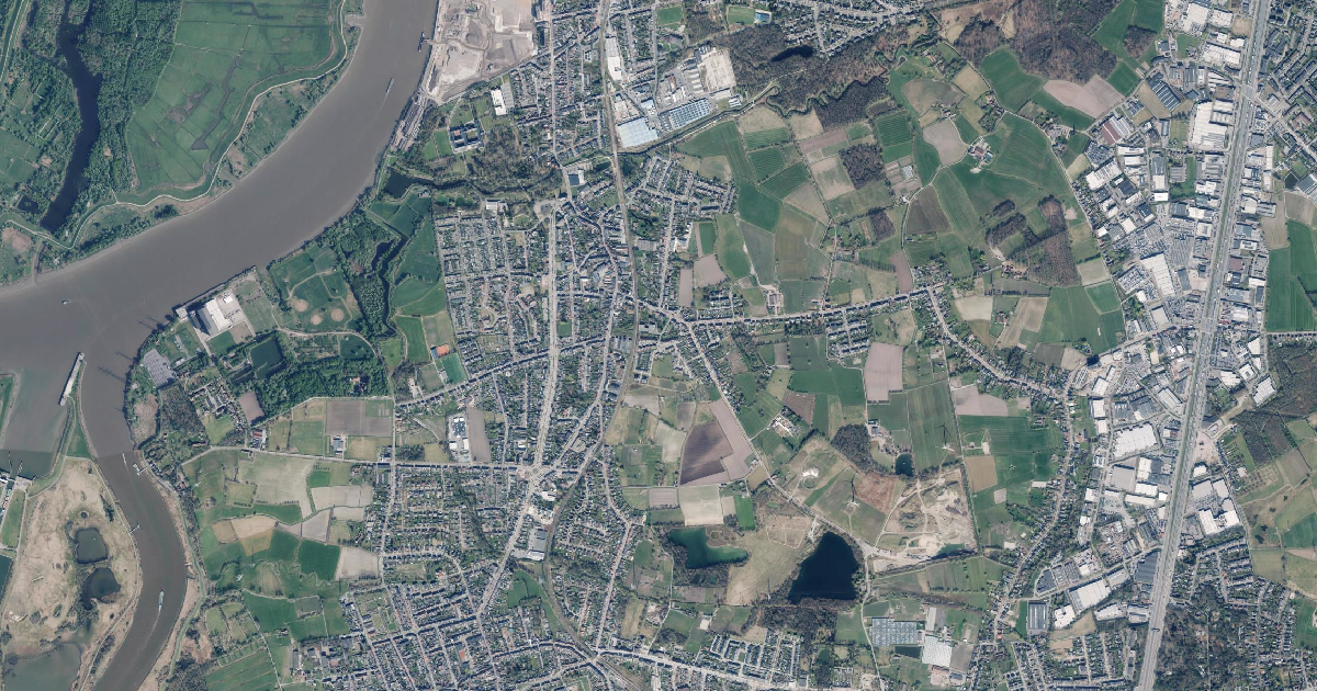 Luchtfoto van Schelle met de gemeentegrens