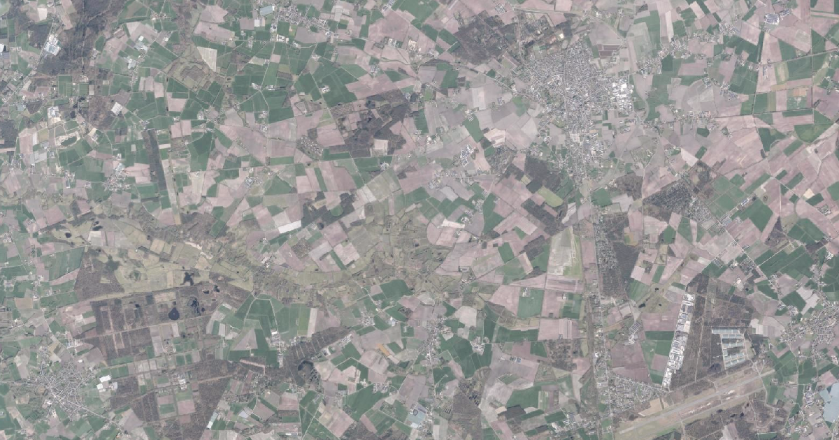 Luchtfoto van Baarle-Hertog met de gemeentegrens