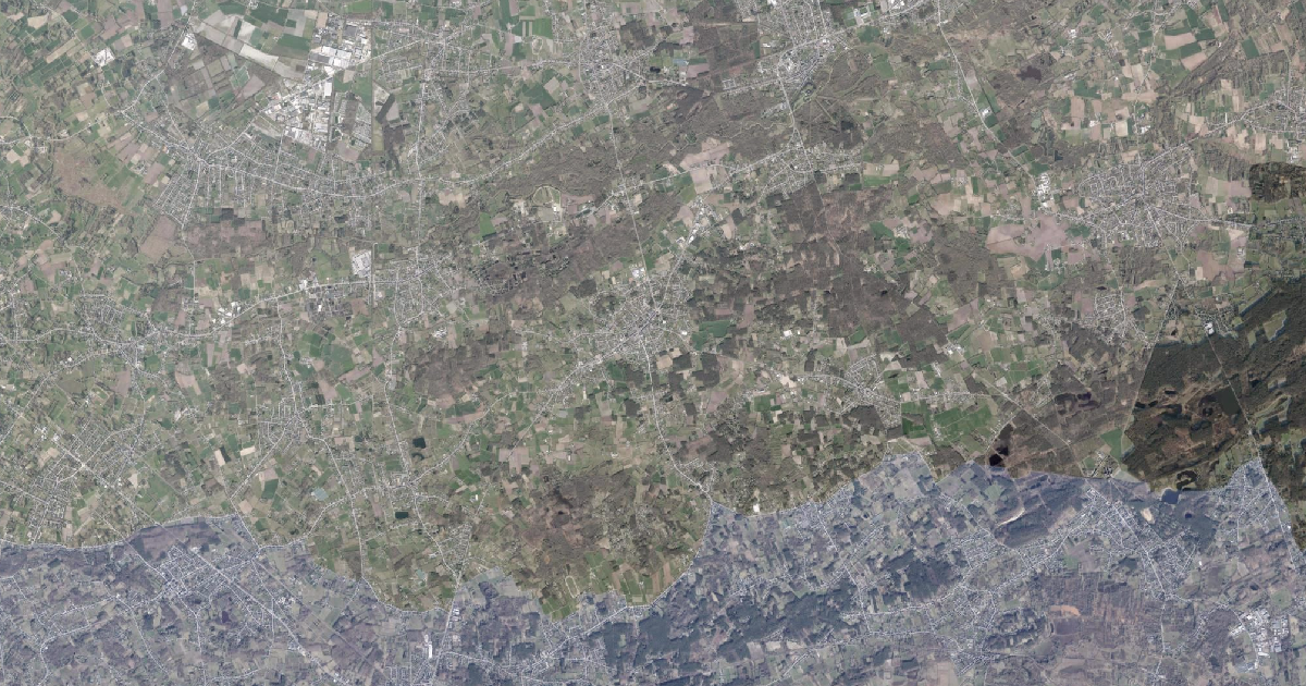 Luchtfoto van Herselt met de gemeentegrens