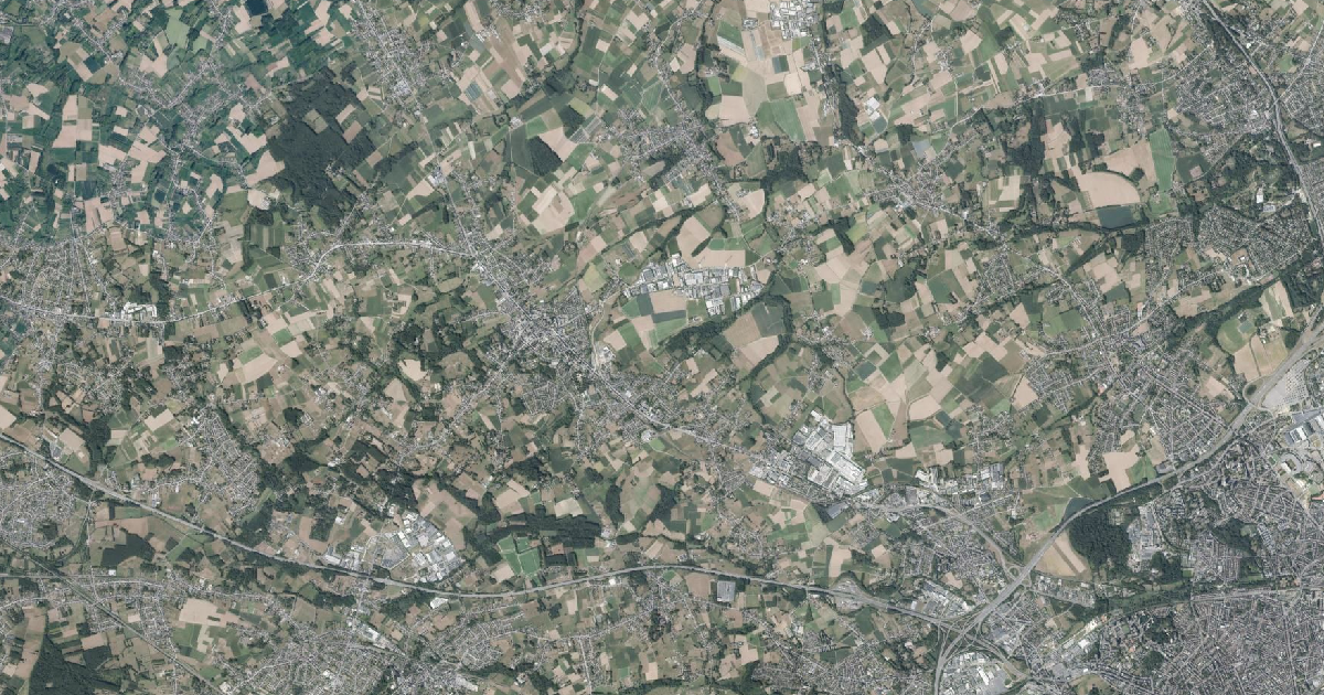 Luchtfoto van Asse met de gemeentegrens