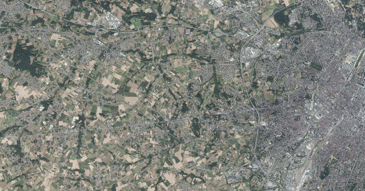 Luchtfoto van Dilbeek met de gemeentegrens