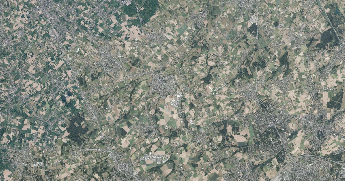 Luchtfoto van Merchtem met de gemeentegrens