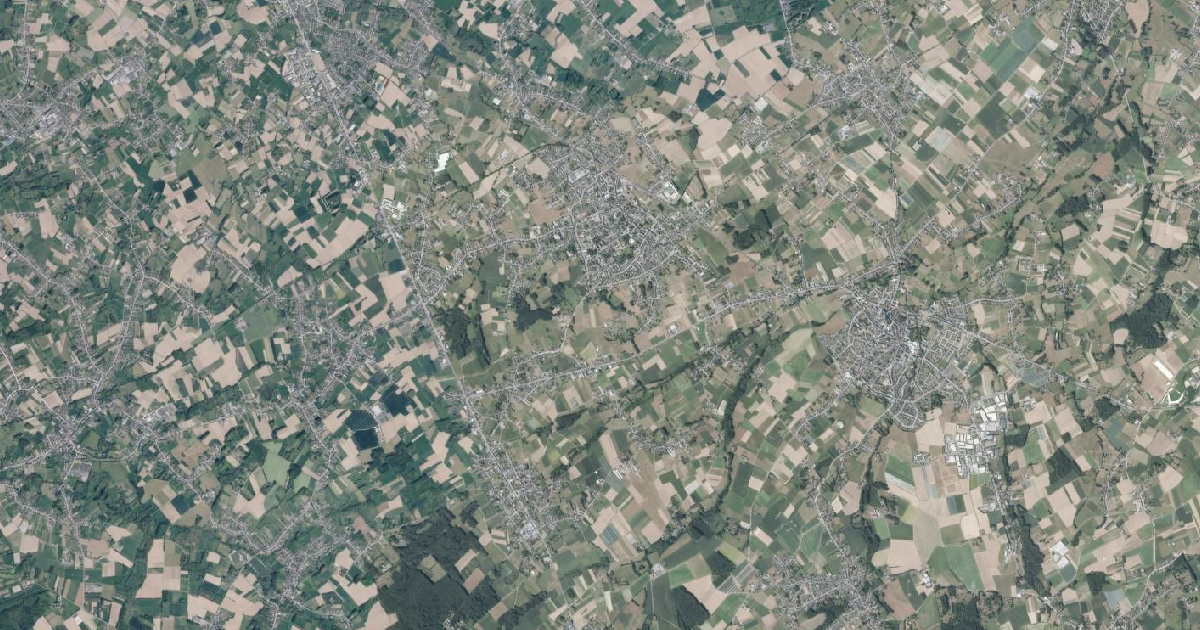 Luchtfoto van Opwijk met de gemeentegrens