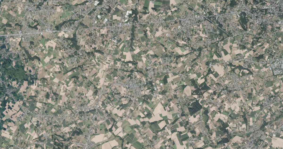 Luchtfoto van Lennik met de gemeentegrens