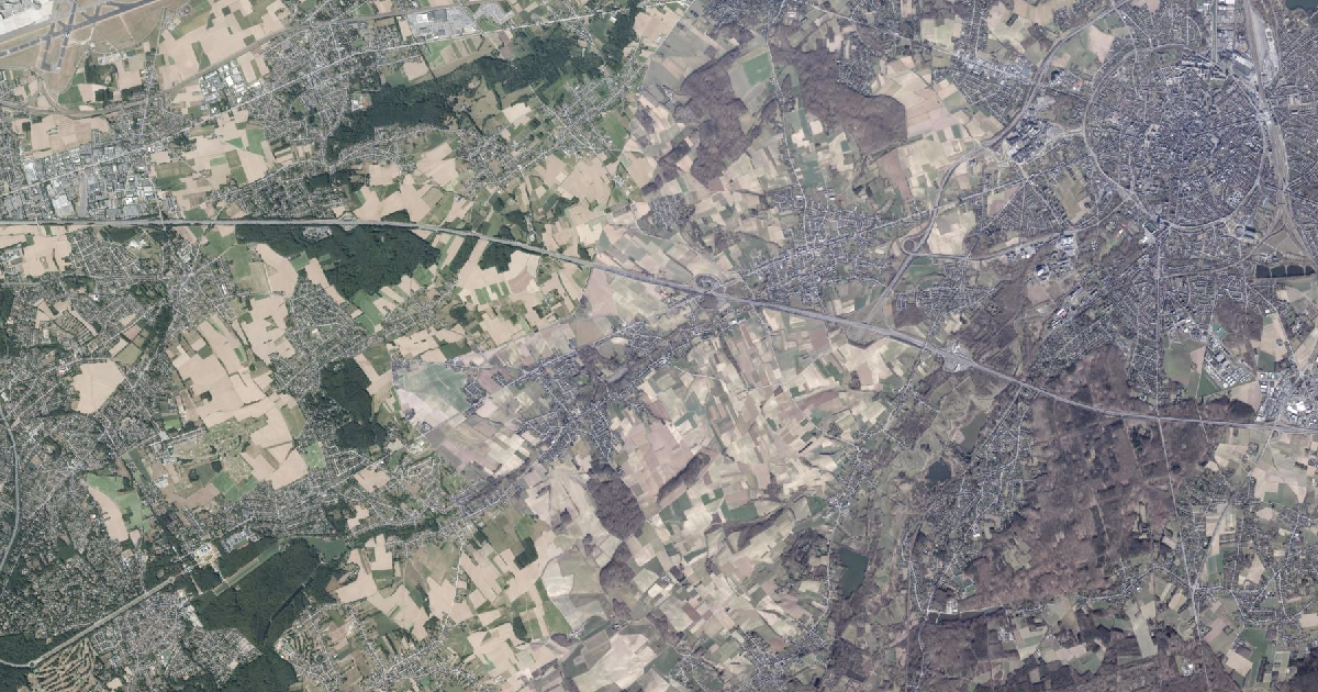 Luchtfoto van Bertem met de gemeentegrens
