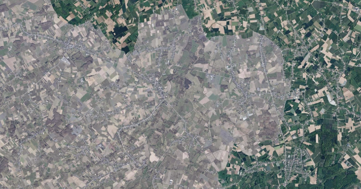 Luchtfoto van Geetbets met de gemeentegrens