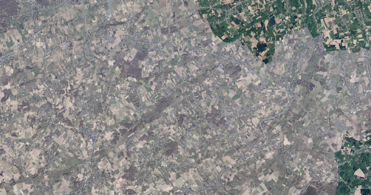 Luchtfoto van Kortenaken met de gemeentegrens