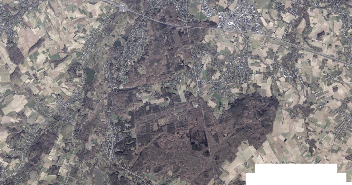 Luchtfoto van Oud-Heverlee met de gemeentegrens
