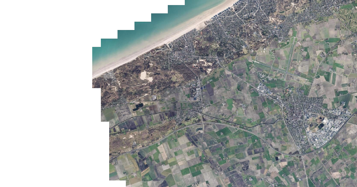 Luchtfoto van De Panne met de gemeentegrens