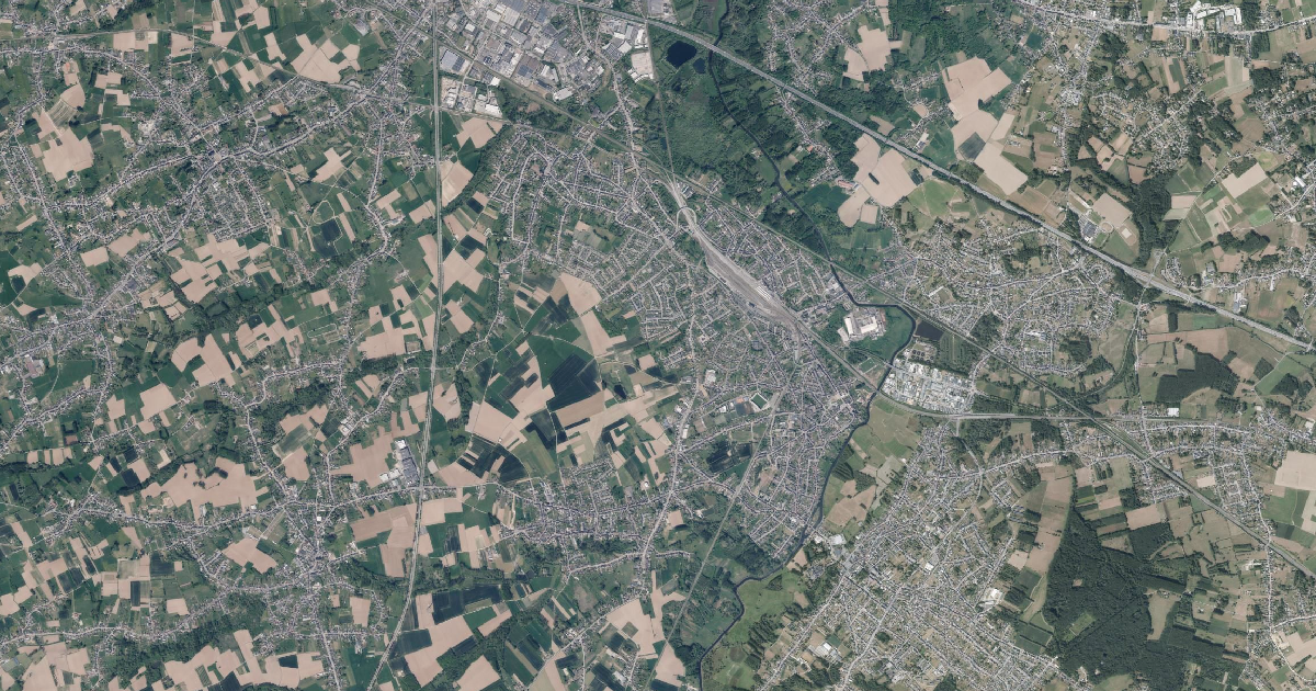 Luchtfoto van Denderleeuw met de gemeentegrens