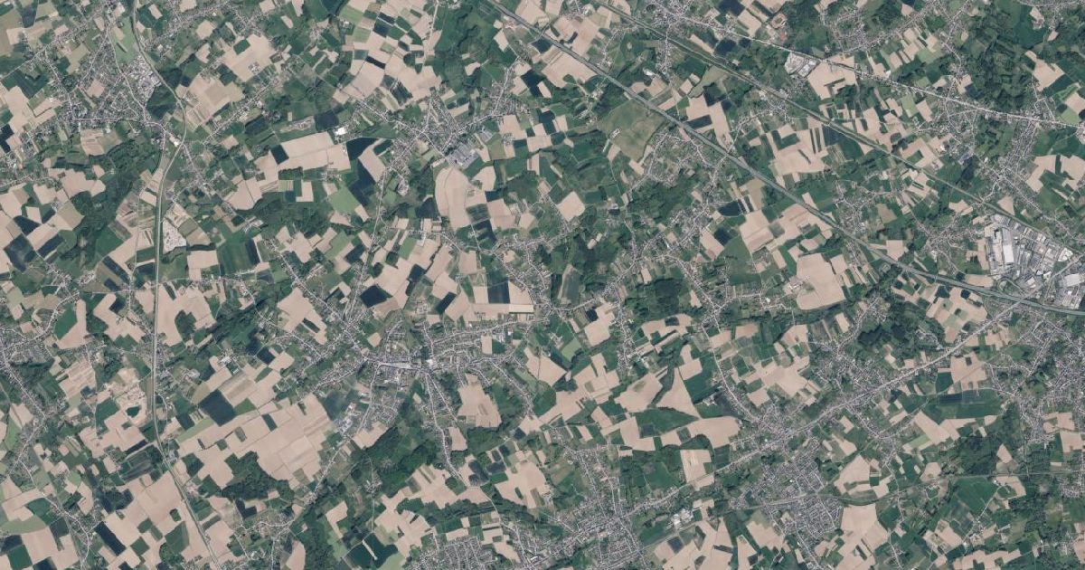 Luchtfoto van Sint-Lievens-Houtem met de gemeentegrens