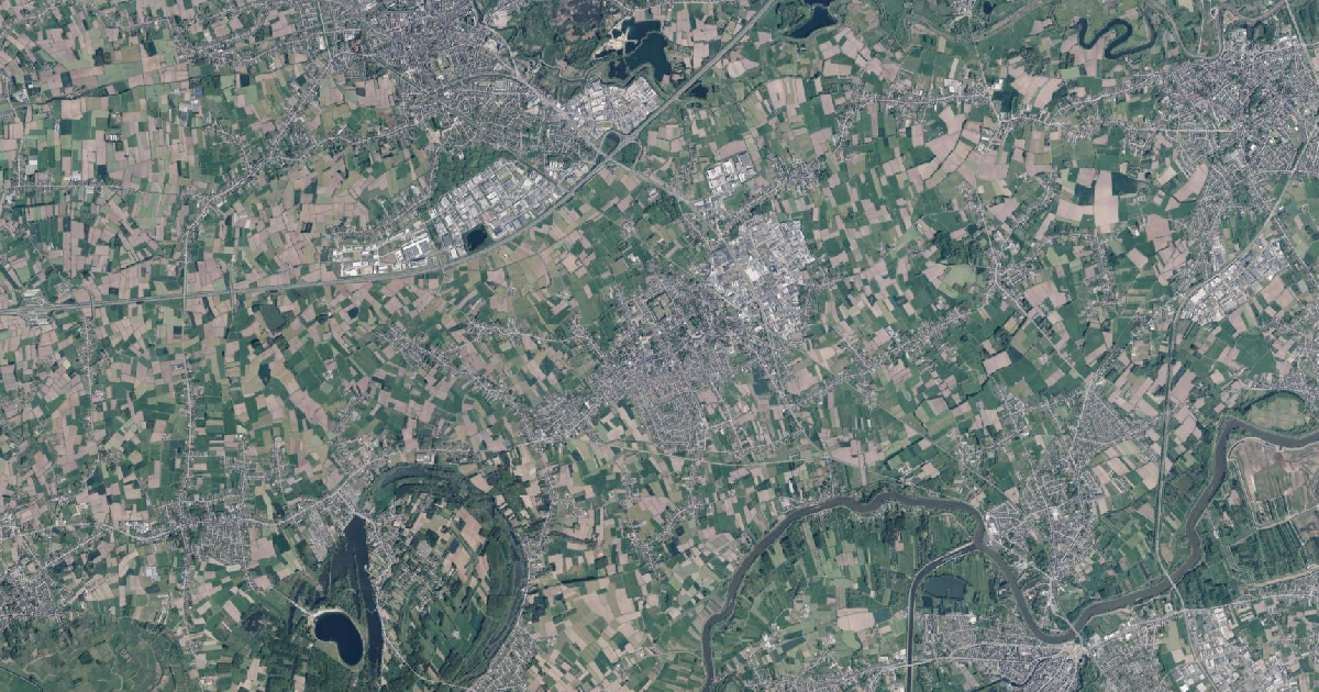 Luchtfoto van Zele met de gemeentegrens
