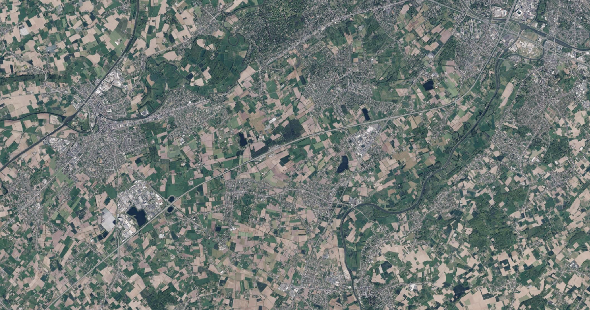 Luchtfoto van Nazareth-De Pinte met de gemeentegrens