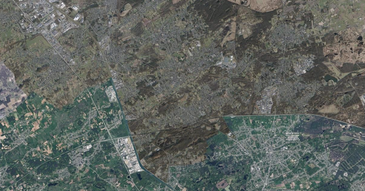 Luchtfoto van Heusden-Zolder met de gemeentegrens