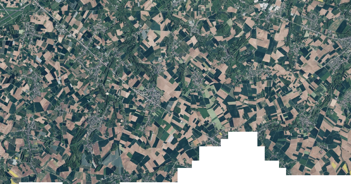 Luchtfoto van Heers met de gemeentegrens