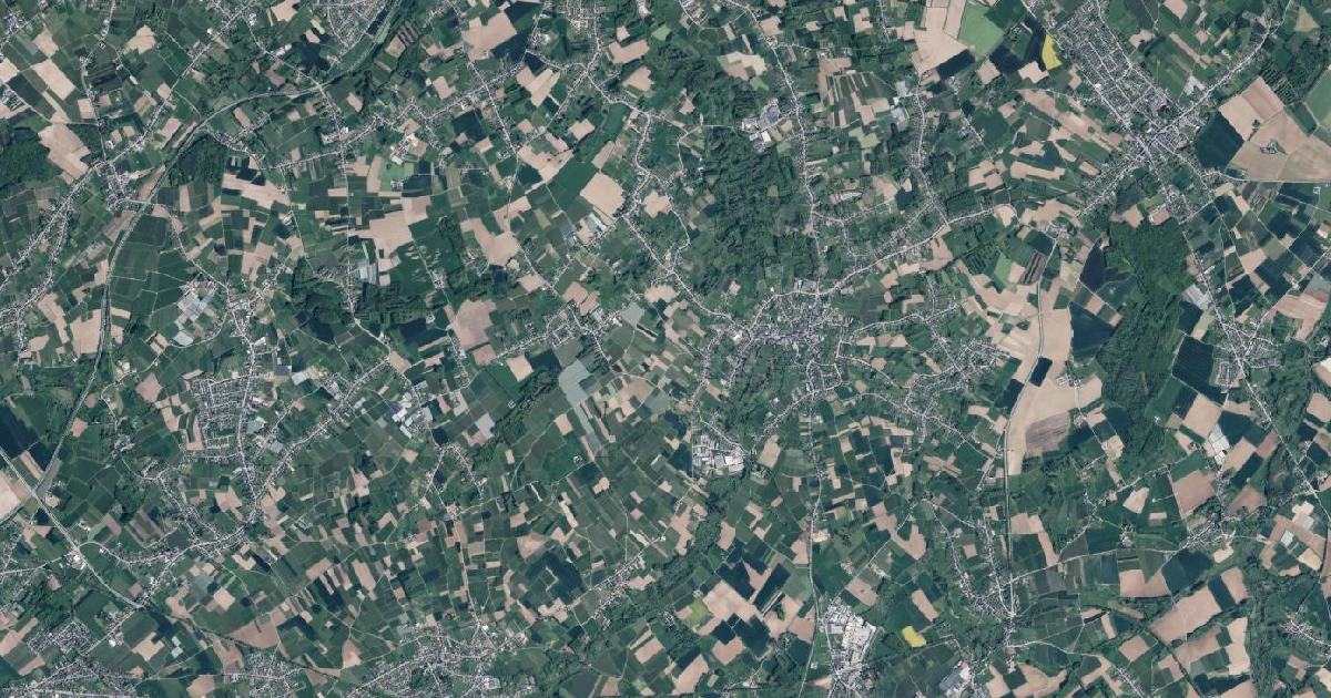 Luchtfoto van Wellen met de gemeentegrens